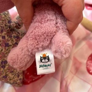 Black GarmentJellycat. Bunny. Plays lullaby